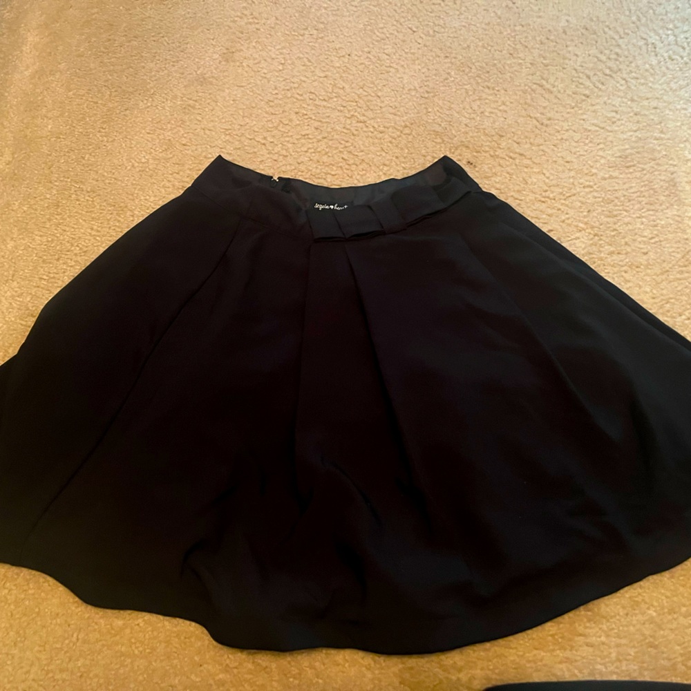 med length black skirt